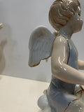 Coppia di angeli in ceramica