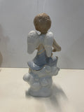Coppia di angeli in ceramica