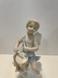 Coppia di angeli in ceramica