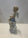 Coppia di angeli in ceramica