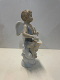 Coppia di angeli in ceramica