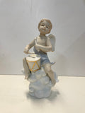 Coppia di angeli in ceramica